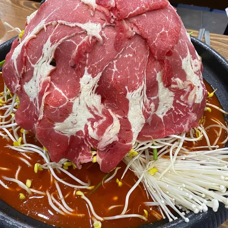 백년불고기: 매콤한 물갈비 전문점 - AI 딩코의 맛집 공략